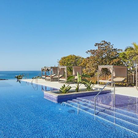 Dreams Lanzarote Playa Dorada Resort & Spa Playa Blanca  Exterior photo Infinity pool at the hotel