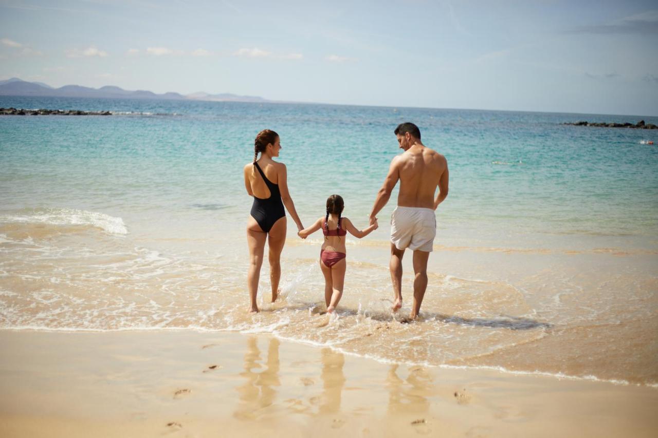 Dreams Lanzarote Playa Dorada Resort & Spa Playa Blanca  Exterior photo Family on a beach